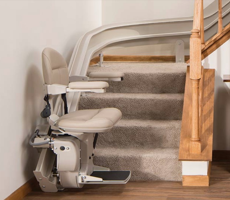 Bruno Elite curved stair lift following an indoor staircase, shown as an equipment example